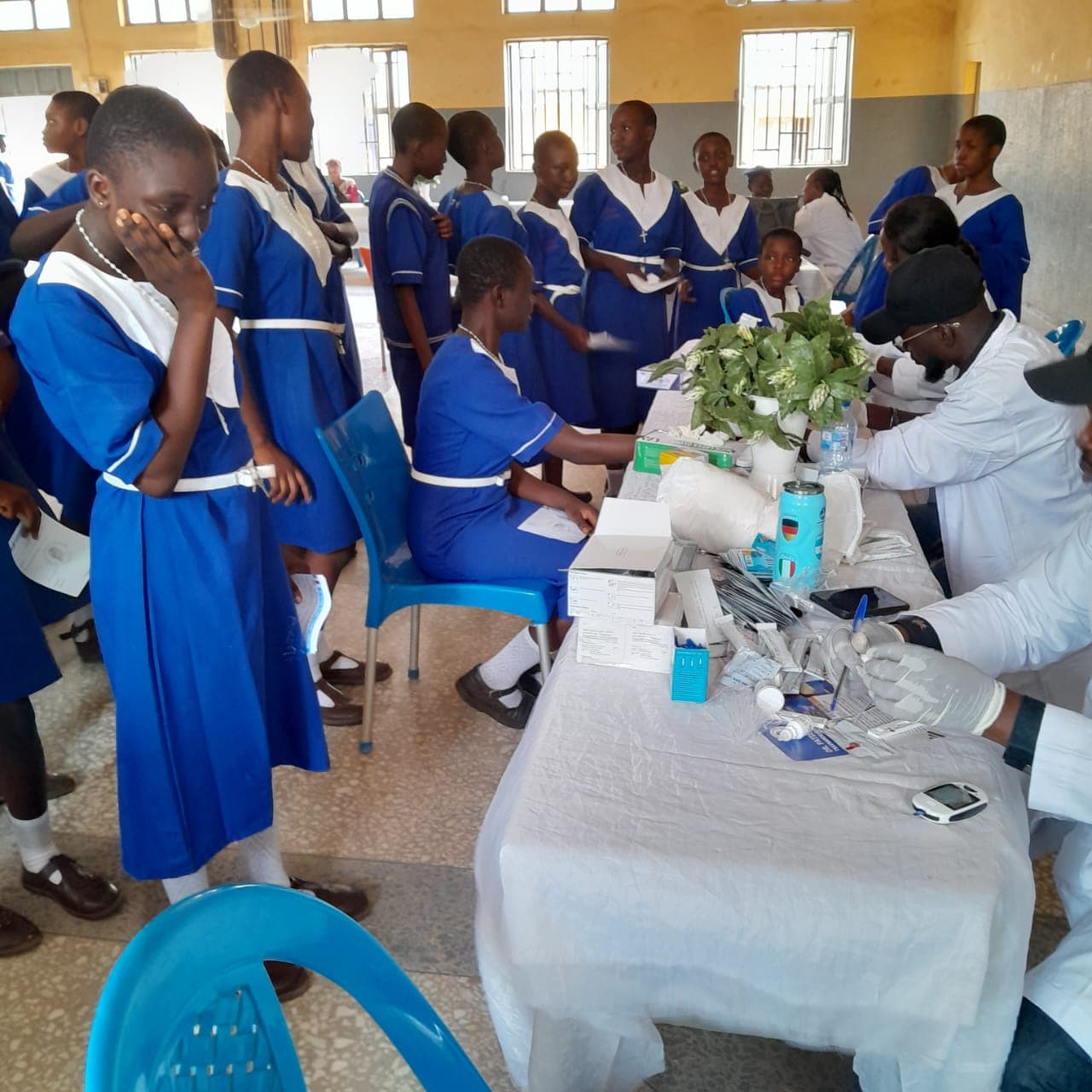 Group photo of volunteers and staff at the Our Lady of Fatima outreach event.