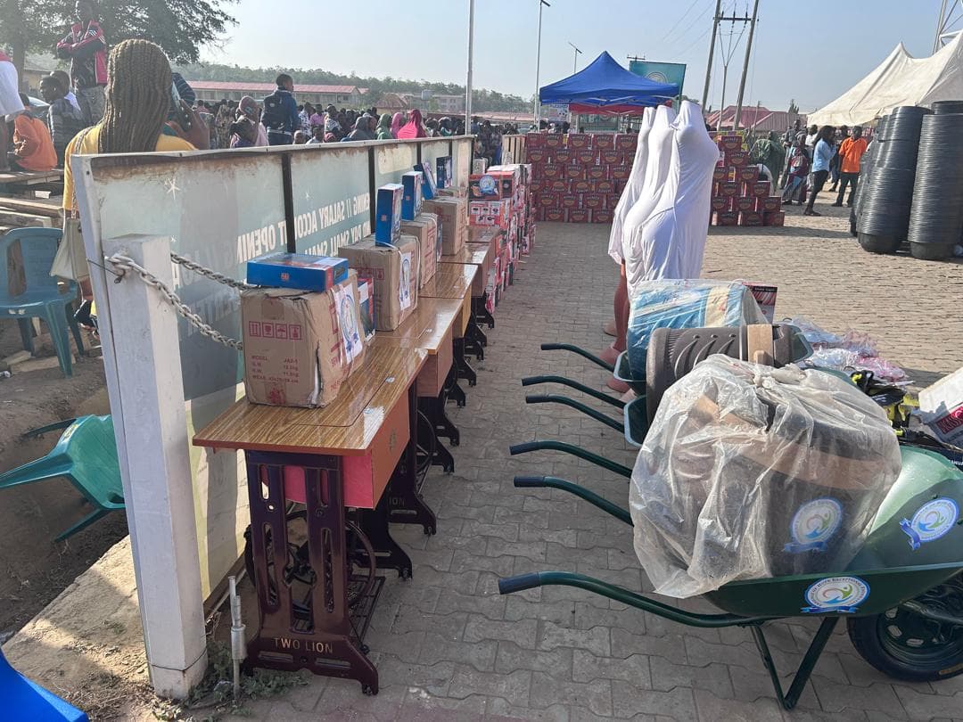 Food supplies like yams and boxes of goods prepared for distribution.
